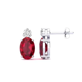 1 Carat Oval Ruby And Diamond Stud Earrings In 14 Karat White Gold