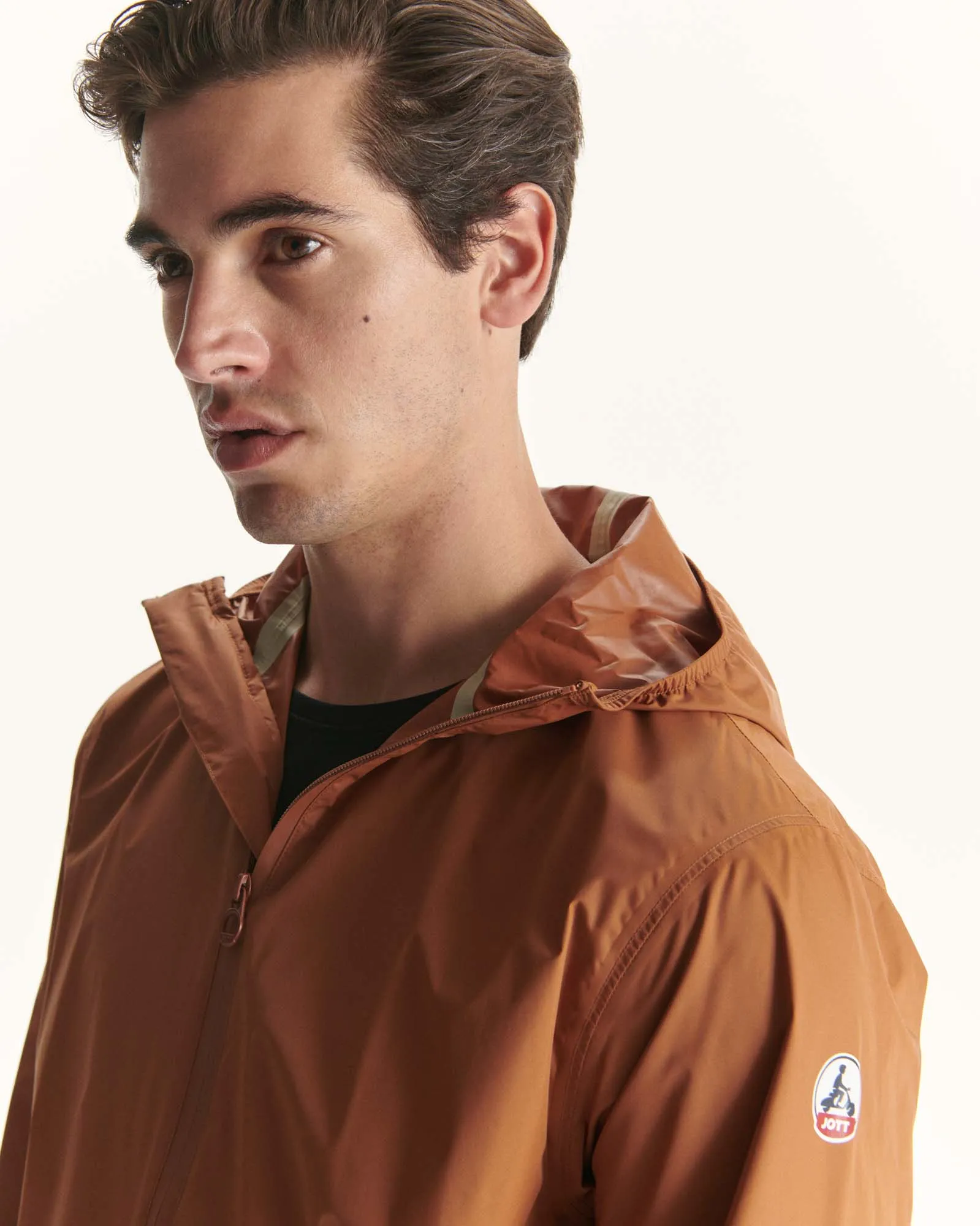 Caramel Manille packable waterproof hooded long jacket